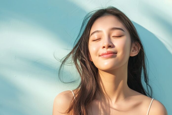 美しい髪が靡いているアジア人女性