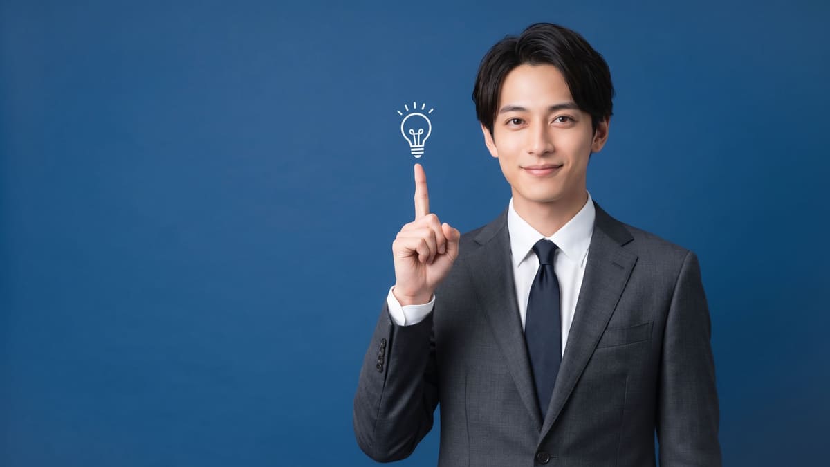 人差し指に電球　男性